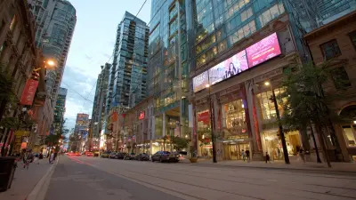 The Impact of Large Building Signs on Urban Navigation and Business Visibility